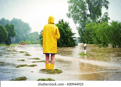 Woman On A Flooded Street