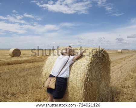 Woman on harvest field