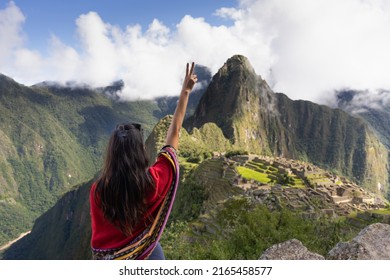 woman on her back enjoying her arrival at machu picchu - Powered by Shutterstock