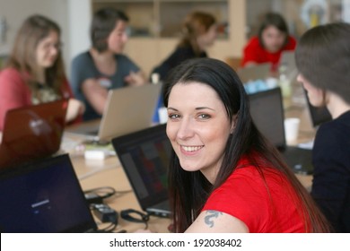 Woman On A Laptop Computer, Working With A Group Of Female University Students Of Computer Science, Programming Code