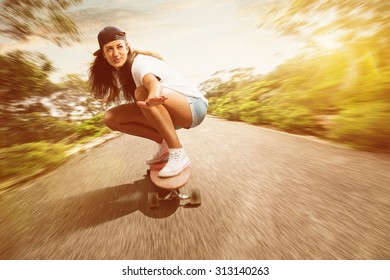 Woman On A Longboard