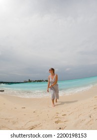 Woman On The Maldives Beach. Gopro Photo