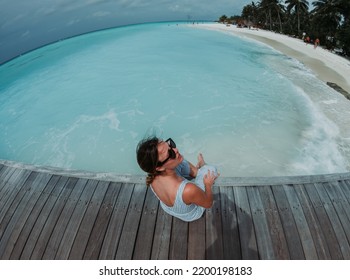 Woman On The Maldives Beach. Gopro Photo