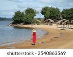 woman on massaonir beach, on the xingu river, in altamira, pará