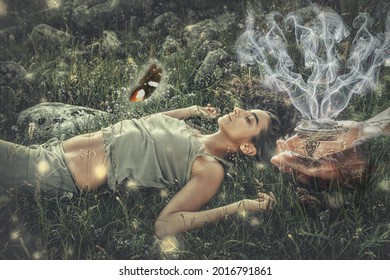 woman on meadow, incense in a woman hand.