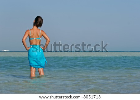 woman on one beach with some cloth