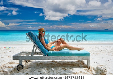 Woman on Petite Anse beach at Seychelles, Mahe