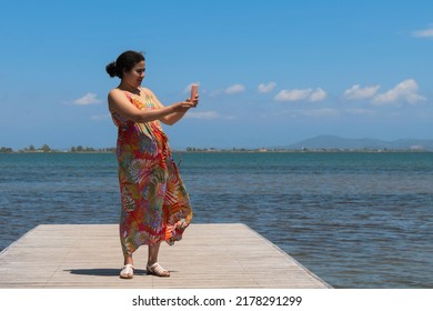 A Woman On A Pontoon Bridge: Selective Focus. 