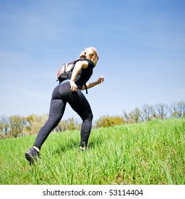 Woman On Power Walking Training Outdoors In Mountains