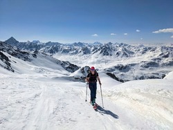 A Woman On A Ski Tour In A Wonderful Mountain Landscape.Freedom And Pure Passion For Ski Mountaineering. Gorihorn Davos