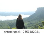 woman on a viewpoint to Morro do Gritador in Pedro II, Piauí