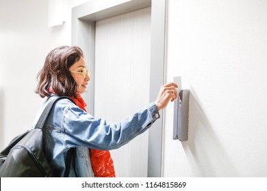 Woman open the Hotel door with electronic key card, access control system