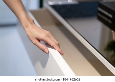 Woman Open Shelf, Pull Open Drawer Wooden In Cabinet.