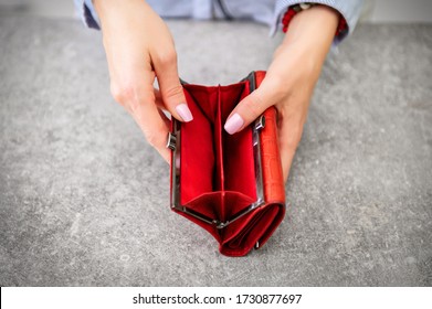 Woman Opening Completely Empty Wallet