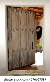 Woman Opening Front Door