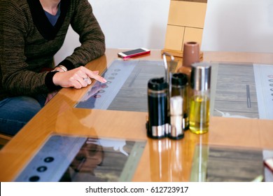 Woman Ordering From A Modern Touchscreen Menu