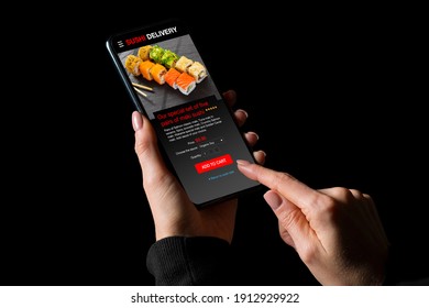 Woman ordering sushi on mobile phone for home delivery - Powered by Shutterstock