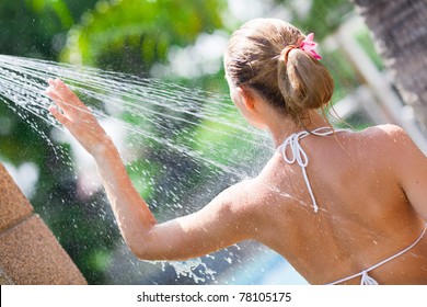 Woman In Outdoor Shower