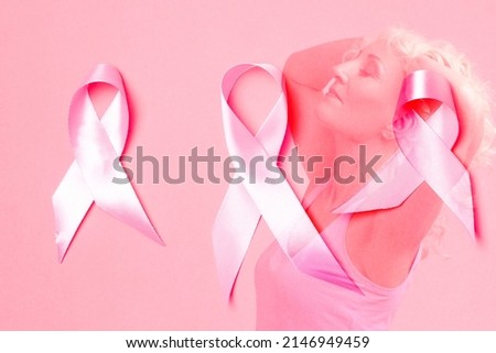 Woman Over Pink Ribbon Background As Breast Cancer Awareness Month Symbol and Women Healthcare Concept of Campaign Against Cancer.Horizontal Image