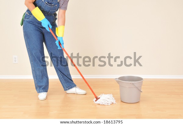 Woman Overalls Mopping Floor Vacant Room Stock Photo Edit Now 18613795