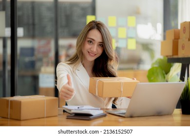 Woman Owner Of A Startup Company Selling Products Online On An Online Store Platform, Sending Goods Through A Courier Company, Business Planning. Online Selling And Online Shopping Concepts.