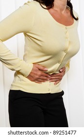 Woman With Pain In The Abdomen And Groin. Menstrual Pain.