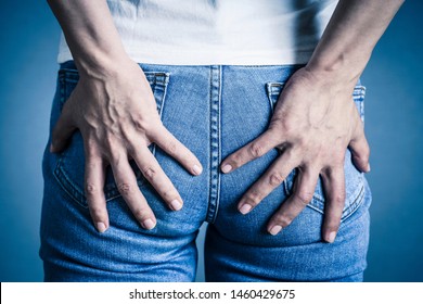 Woman With Pain In The Buttocks