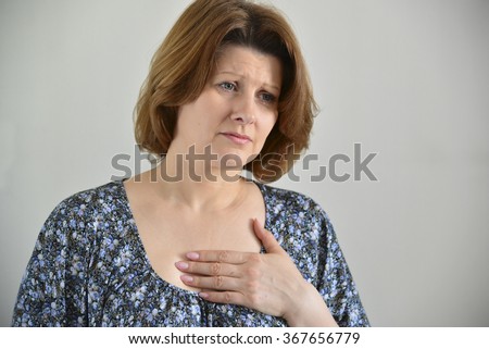 Woman with pain in the chest, angina