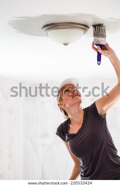 Woman Painting Edges Ceiling Paintbrush Stock Photo Edit Now