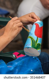 Woman Painting A Pottery Vase