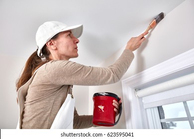 Woman Painting Wall