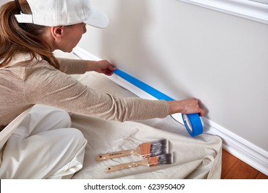 Woman Painting Wall