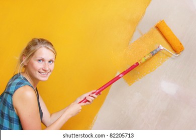 Woman Painting Wall