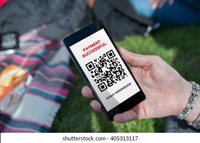 Woman In The Park, Hand Holding The Phone, With QR Code