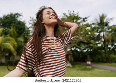 woman park summer t-shirt smiling freedom lifestyle nature beautiful enjoy walk - Powered by Shutterstock