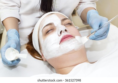 woman passes treatment mask facial at the beauty salon - Shutterstock ID 361527398