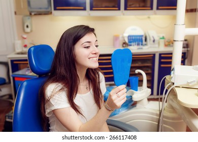 Woman Patient At Dentist Consultation