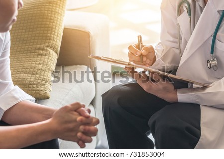 Woman patient having consultation with doctor (gynecologist or psychiatrist) and examining  health in medical gynecological clinic or hospital mental health service center