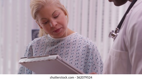 Woman patient telling doctor about her health history