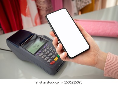 Woman Payment Purchase For Phone And Pay Pass Online Terminal In The Store