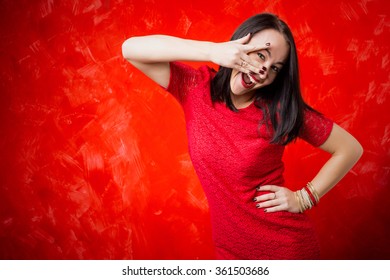 Woman Peeking Through Her Fingers 