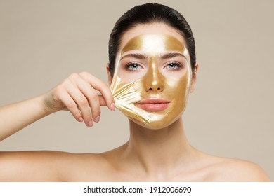 Woman Peel Off Gold Facial Mask. Collagen Golden Anti Aging Wrinkle Lifting Mask. Spa Beauty Treatment