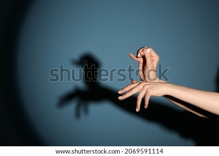 Similar – Image, Stock Photo Shadow play | palm tree and curtain on window