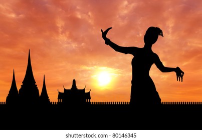 woman performing typical thai dance silhouetted with thai style temple background, identity culture of thailand