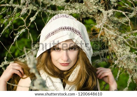 woman, perhaps a witch in the woods - portrait