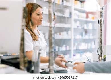 Woman pharmacist  consulting customer at counter for prescription drugs or medicine at the pharmacy. Female doctor giving patient medical antibiotics at the pharmacy  - Powered by Shutterstock