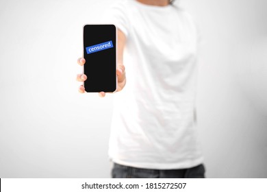 Woman With Phone And Censored Text On It. Social Media Censorship Conflict. 