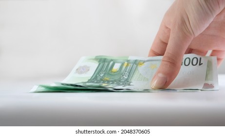 Woman Picking Euro Bills. Handing Picking Money Up. Taking Money Off The Ground Becoming Rich