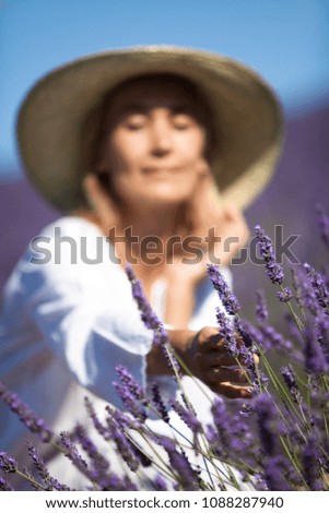 woman picking lavender 