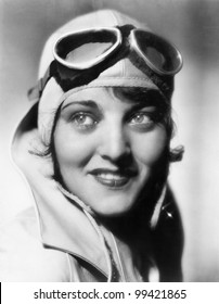 Woman With A Pilots Hat And Goggles